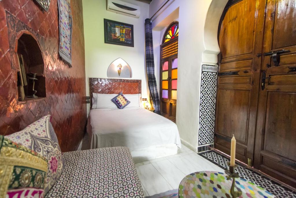 Riad Dar Mansoura 객실 침대