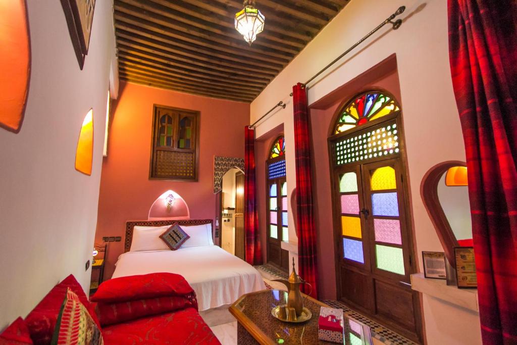 Riad Dar Mansoura 객실 침대