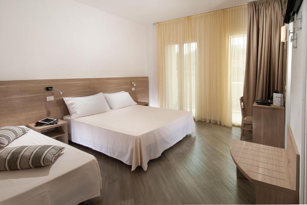 Postel nebo postele na pokoji v ubytování Hotel Atlantic & Spa