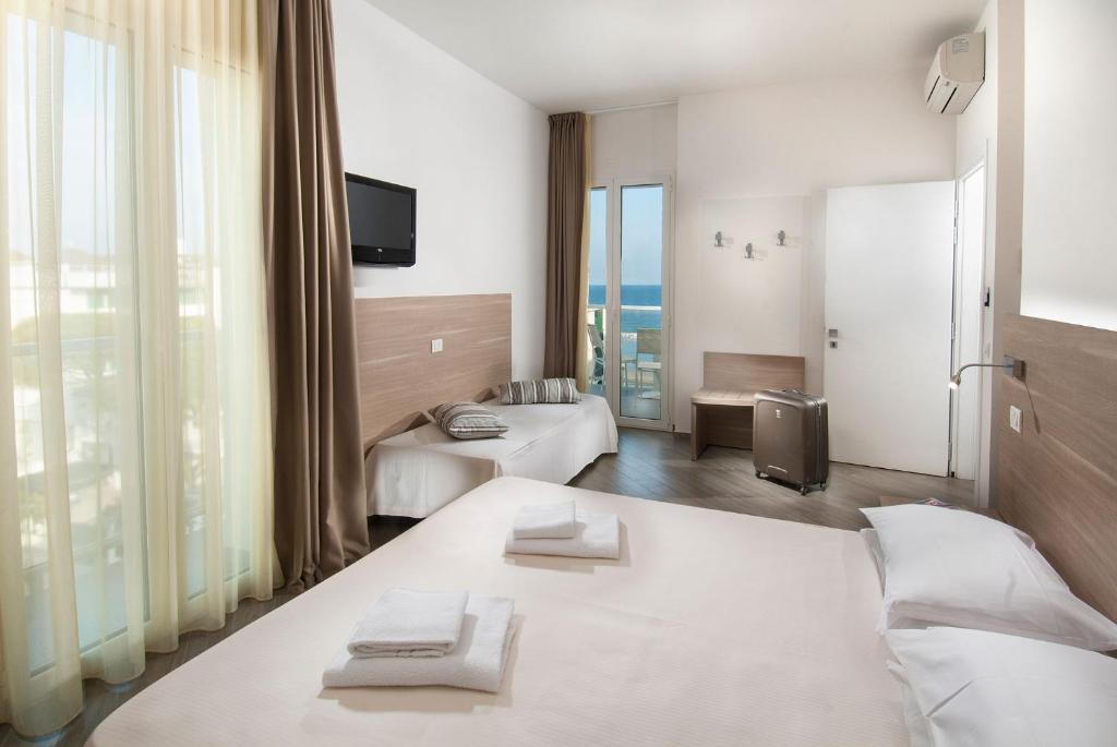 Postel nebo postele na pokoji v ubytování Hotel Atlantic & Spa