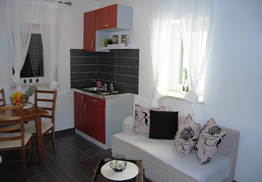 Kuchyňa alebo kuchynka v ubytovaní Apartments Vidilica