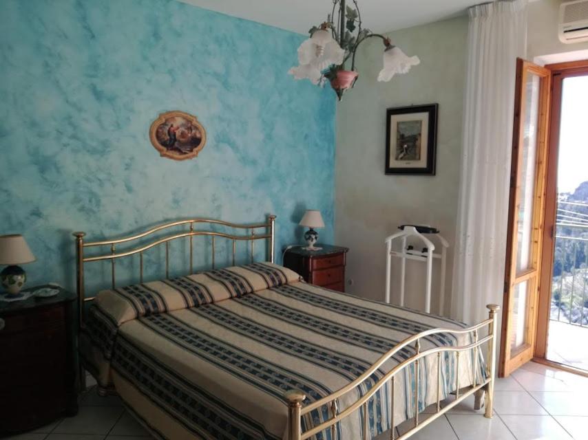 Una cama o camas en una habitación de Domus Gaia