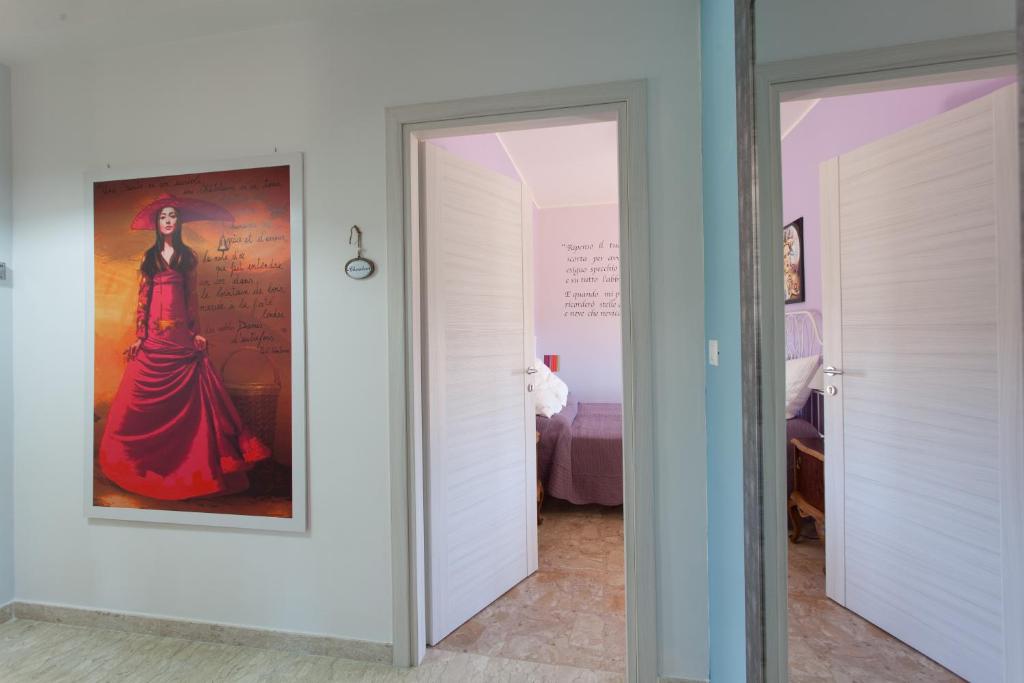 Łóżko lub łóżka w pokoju w obiekcie B&B I Poeti