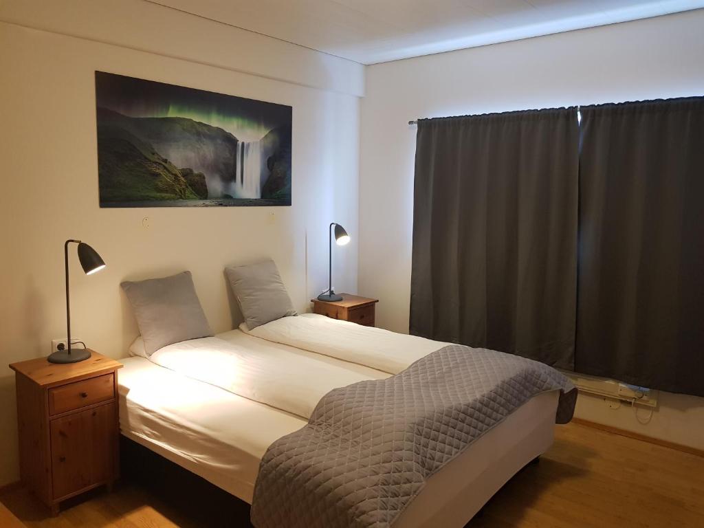 Postel nebo postele na pokoji v ubytování Kirkjufell Hotel by Snæfellsnes Peninsula West Iceland - Grundarfjordur