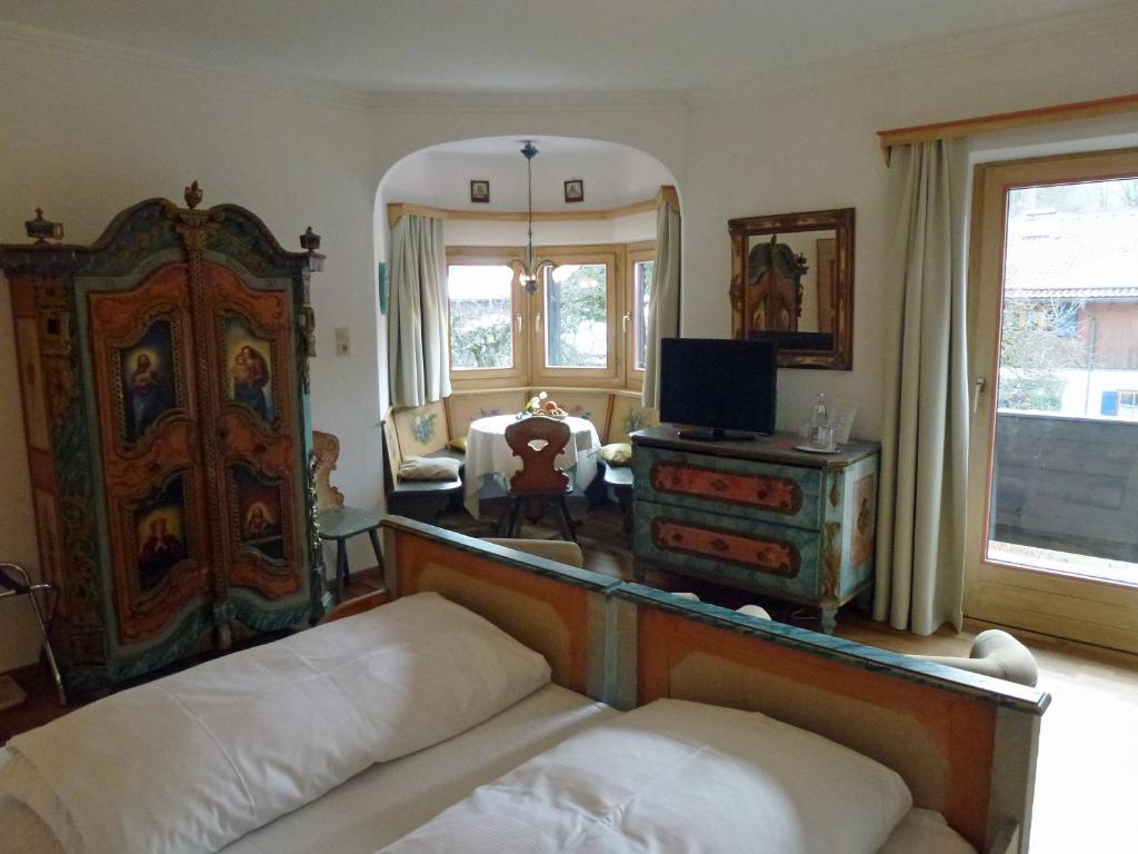 Postel nebo postele na pokoji v ubytování Alpenhof Landhotel Restaurant