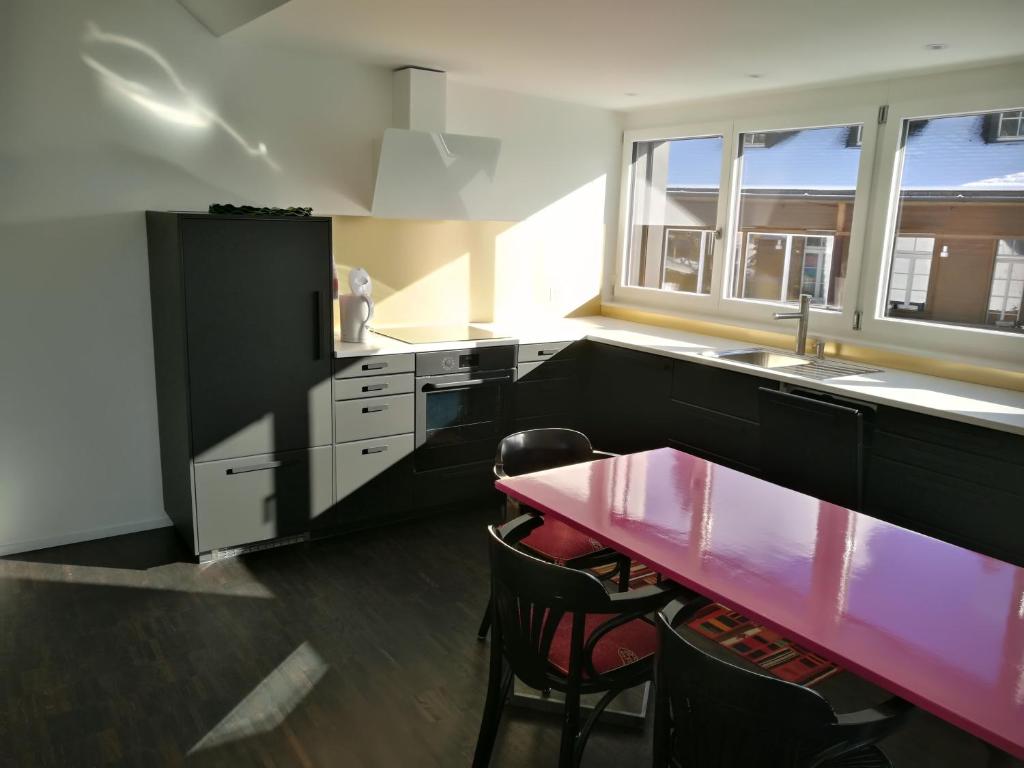 Kuchyň nebo kuchyňský kout v ubytování Ackaert Ferienwohnung Top of Thun