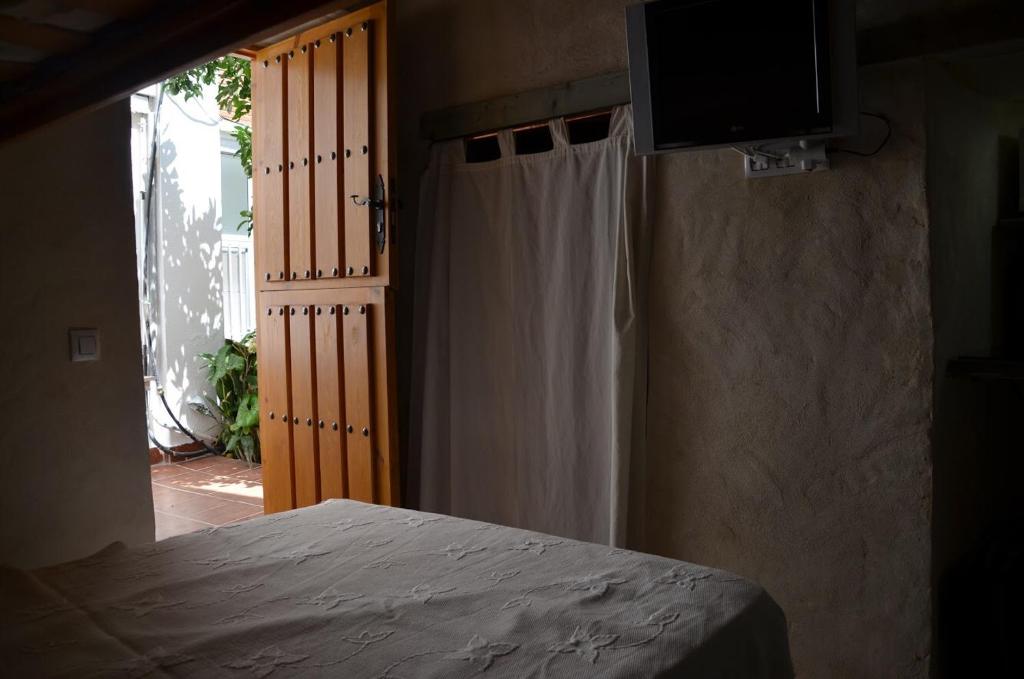 Postel nebo postele na pokoji v ubytování el chaparral