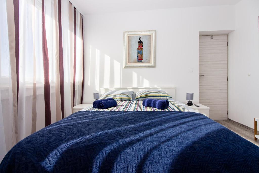Posteľ alebo postele v izbe v ubytovaní Deluxe Apartment Miro