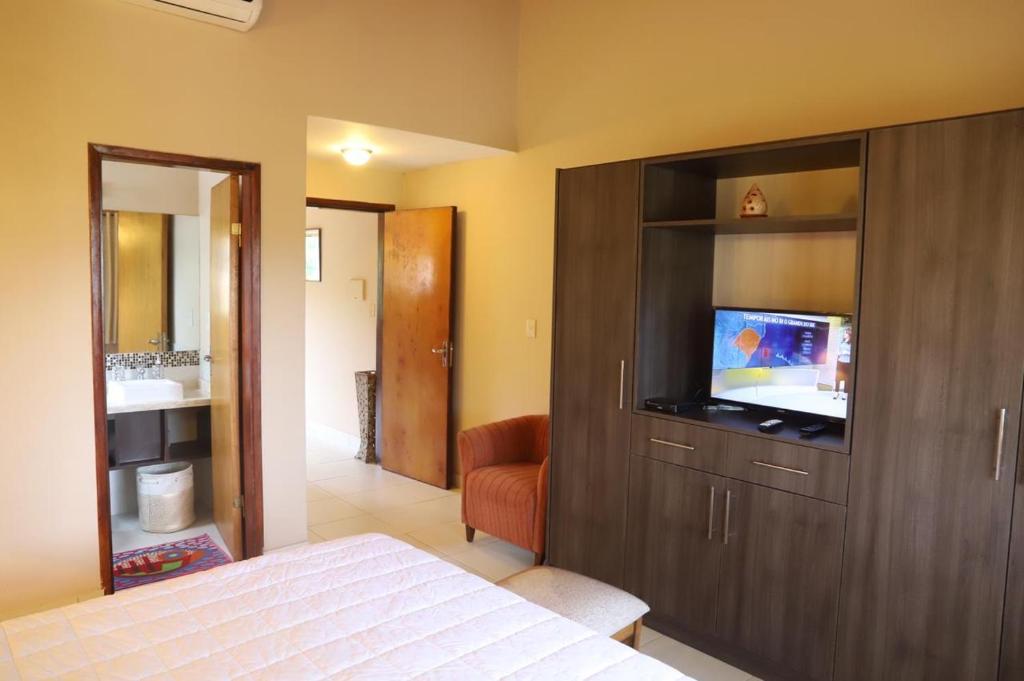 Voodi või voodid majutusasutuse Mandala Apartments toas
