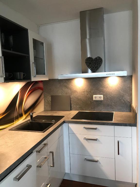 Kuchyň nebo kuchyňský kout v ubytování Ferienidyll Nordwind