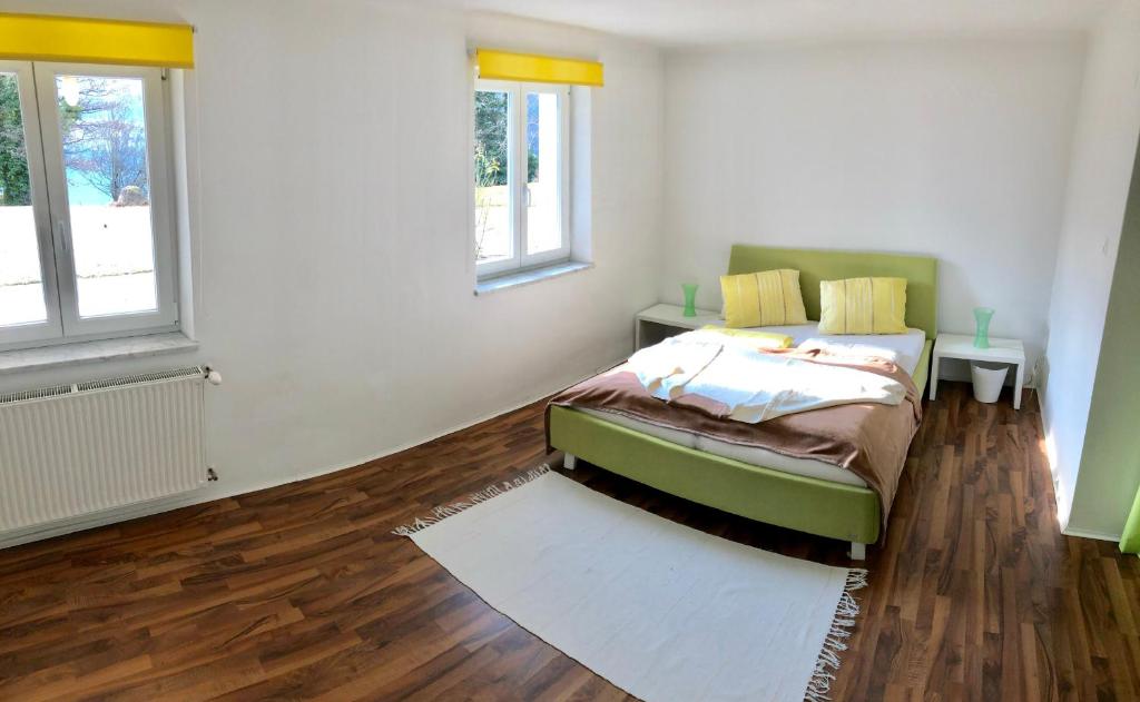 Postel nebo postele na pokoji v ubytování Ferienhaus am See