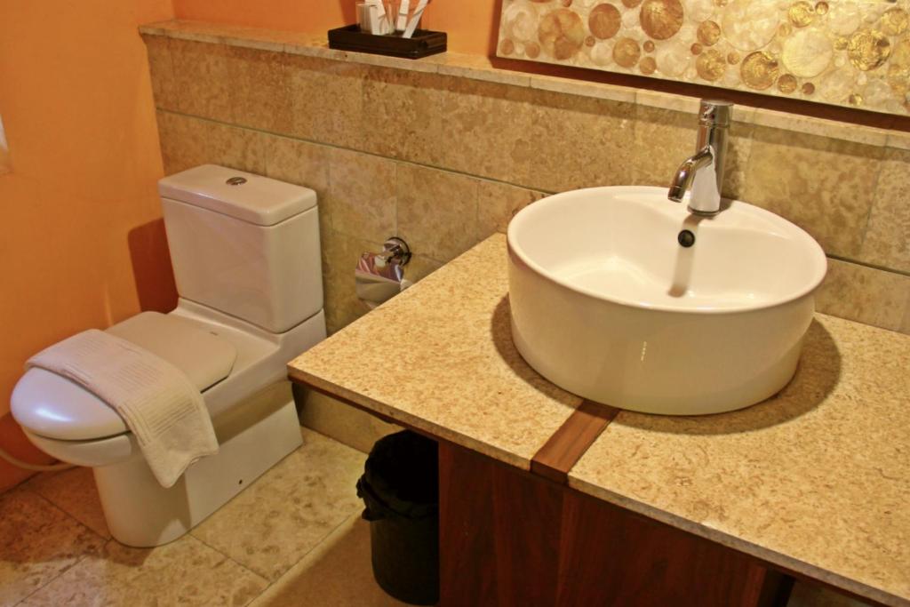 Koupelna v ubytování Tegal Panggung Guest House