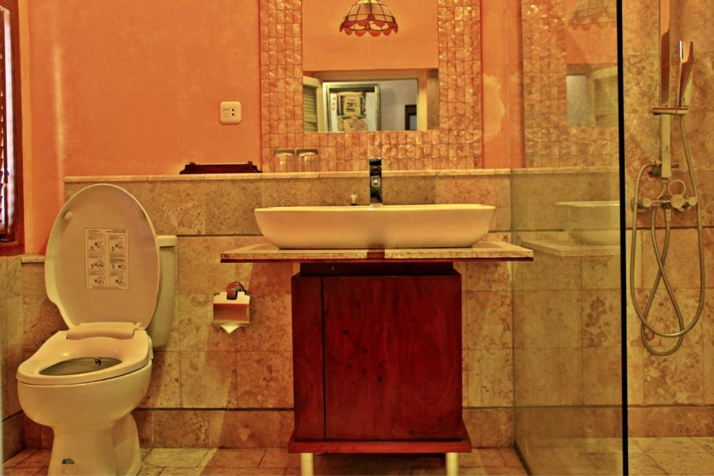 Koupelna v ubytování Tegal Panggung Guest House