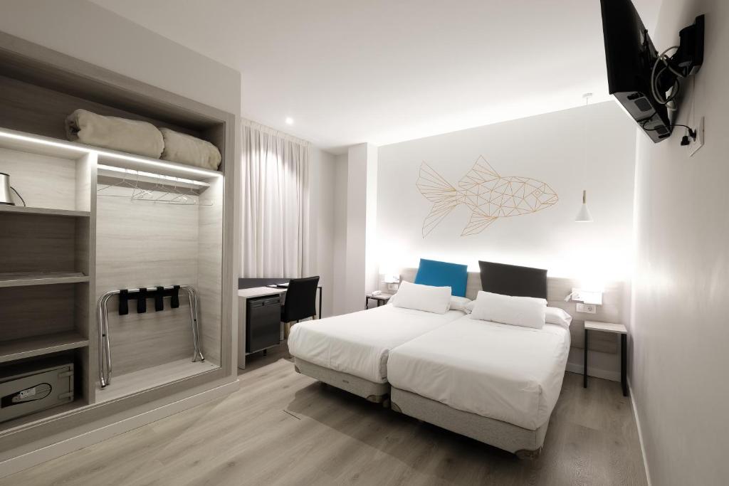 
Cama o camas de una habitación en Hotel Mediterraneo Valencia
