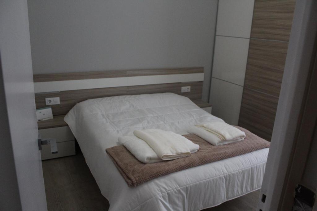 Postel nebo postele na pokoji v ubytování Acogedora casa al lado de Padrón VUT-CO-02999