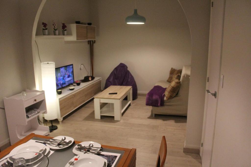 TV a/nebo společenská místnost v ubytování Acogedora casa al lado de Padrón VUT-CO-02999