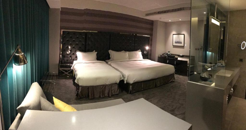 Postel nebo postele na pokoji v ubytování Starhaus Hotel