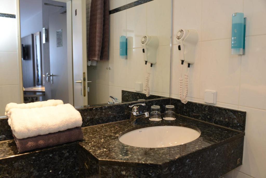 Koupelna v ubytování Hotel Granus