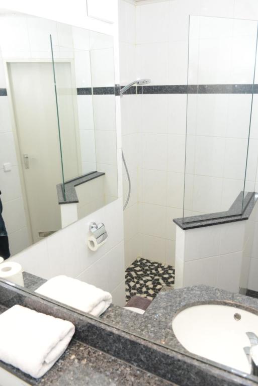 Koupelna v ubytování Hotel Granus