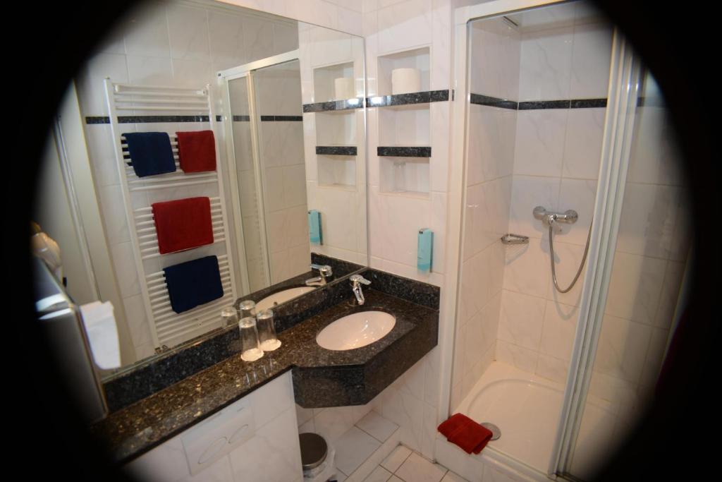 Koupelna v ubytování Hotel Granus