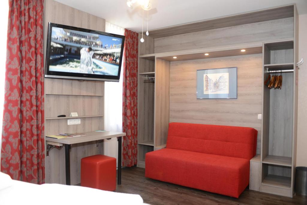 TV a/nebo společenská místnost v ubytování Hotel Granus