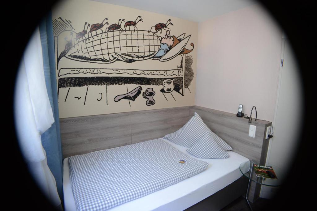 Postel nebo postele na pokoji v ubytování Hotel Granus