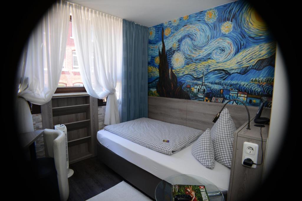 Postel nebo postele na pokoji v ubytování Hotel Granus