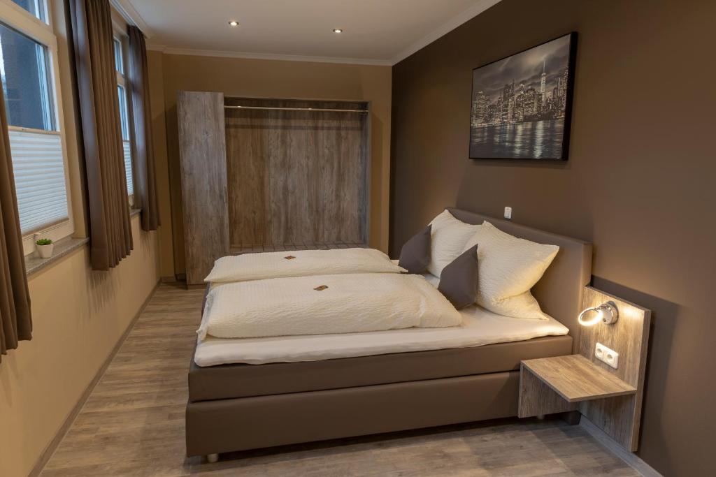 Postel nebo postele na pokoji v ubytování Mey Hotel