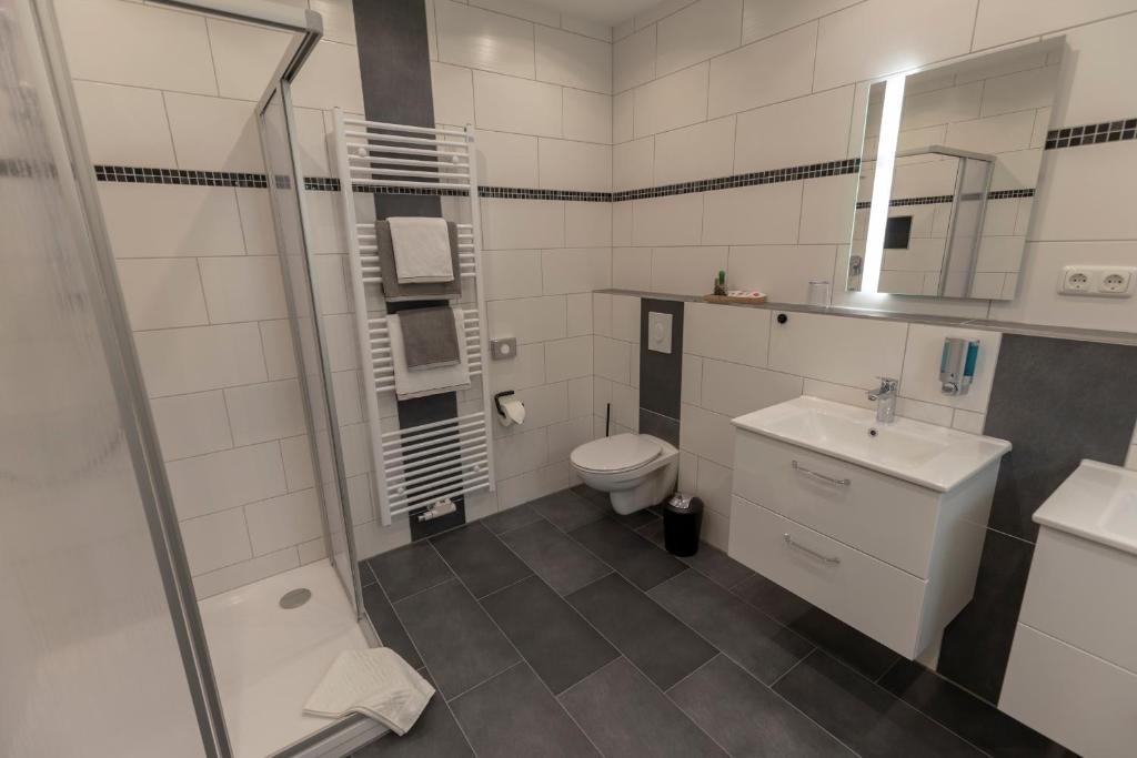 Koupelna v ubytování Mey Hotel