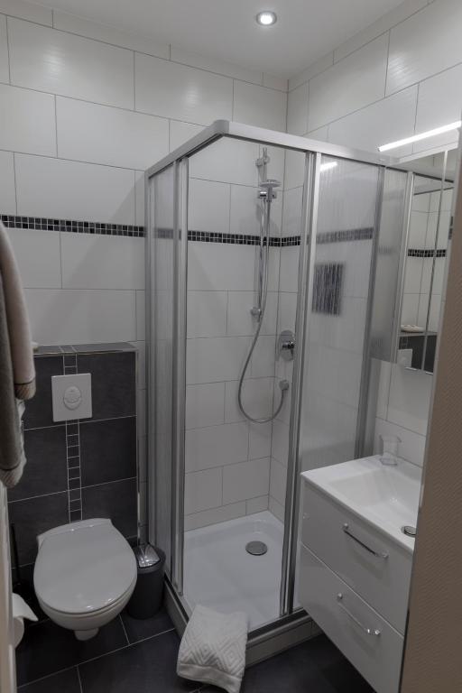 Koupelna v ubytování Mey Hotel