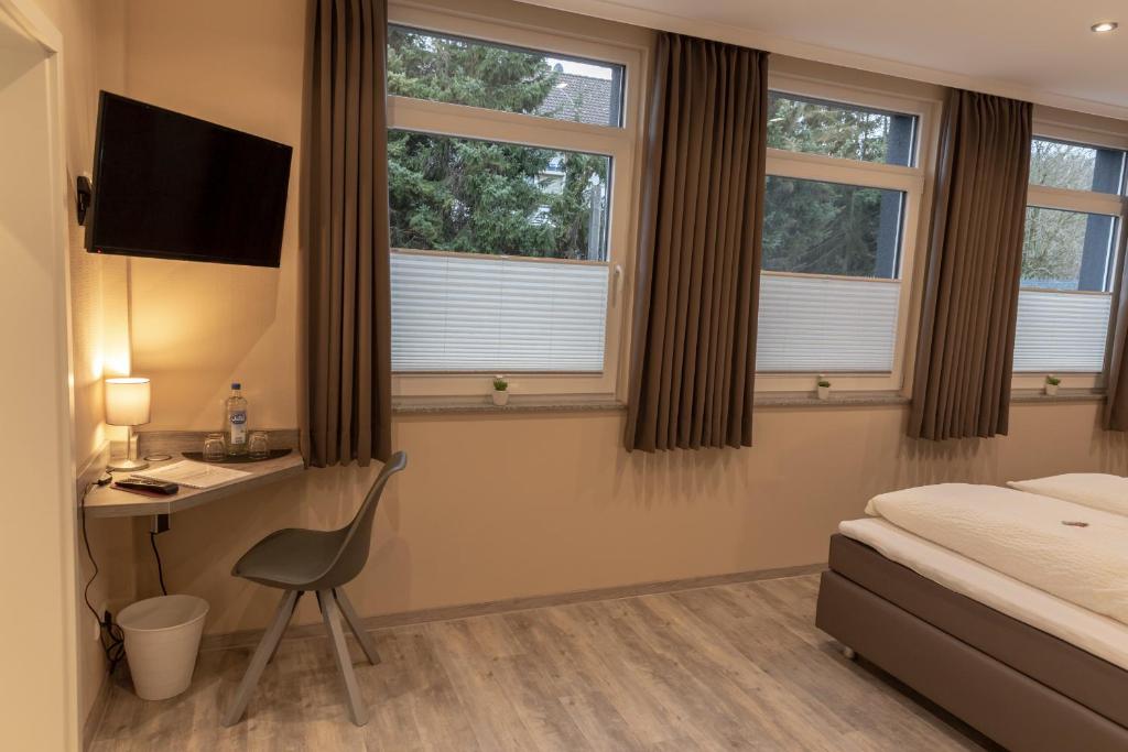 Postel nebo postele na pokoji v ubytování Mey Hotel
