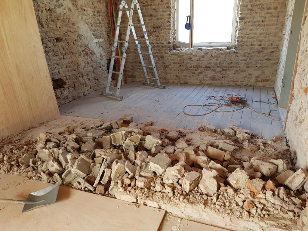 a room with a pile of rocks on the floor at B&B The Project in Heerlen