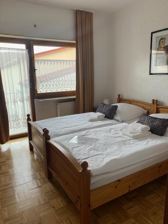 Postel nebo postele na pokoji v ubytování Hotel Bettelhaus