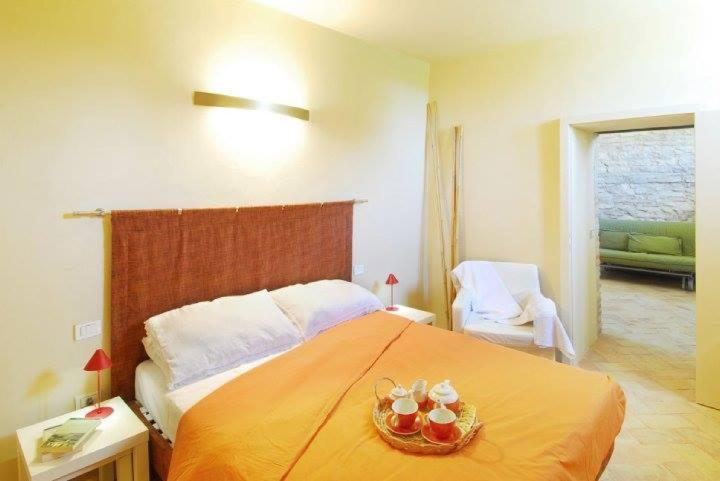 Łóżko lub łóżka w pokoju w obiekcie Agriturismo Molleone