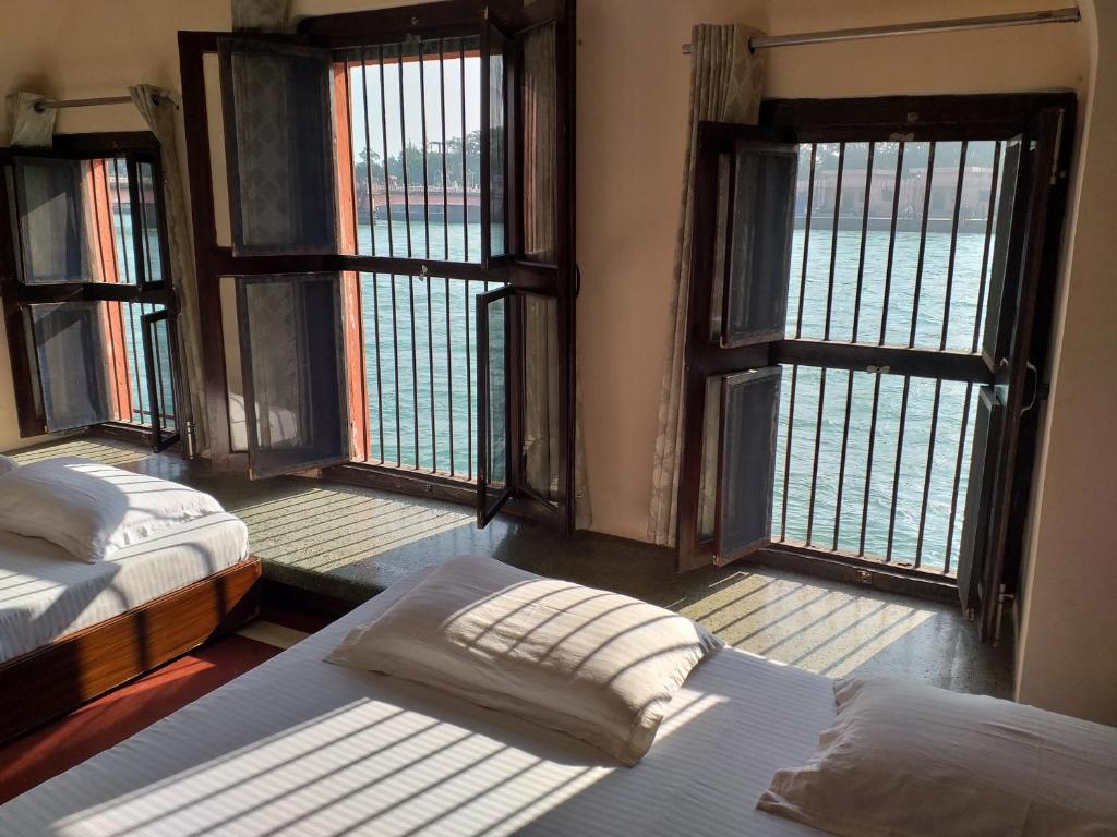 Postel nebo postele na pokoji v ubytování Patnimal Guesthouse