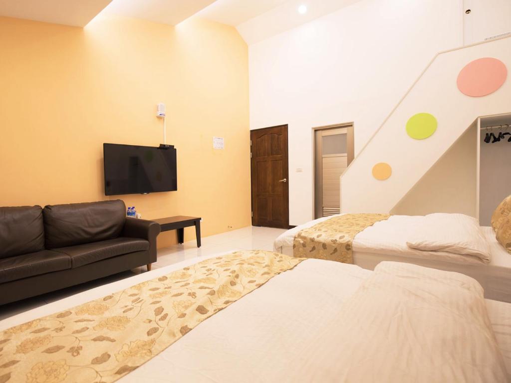 Postel nebo postele na pokoji v ubytování Yilan NAI-JI House