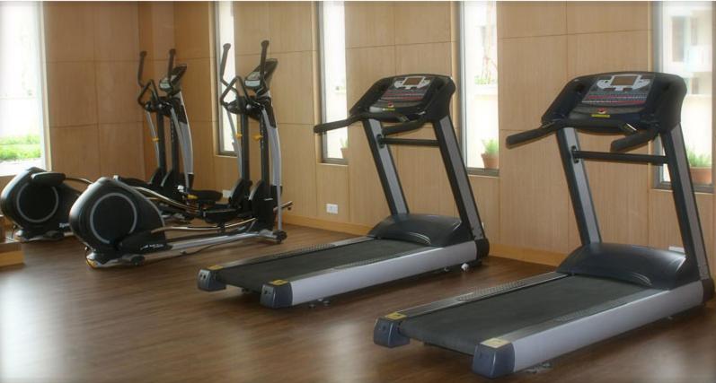 Fitness centrum a/nebo fitness zařízení v ubytování Savoy Suites Manesar