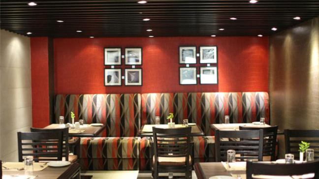 Posezení v ubytování Savoy Suites Manesar