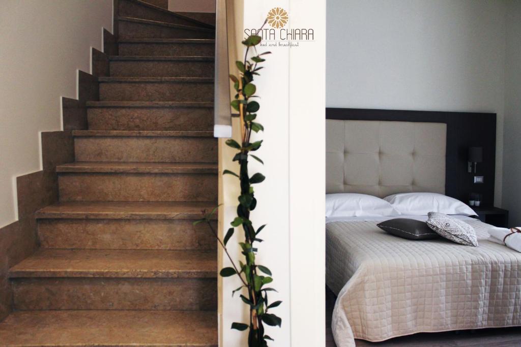 A bed or beds in a room at B&B Dimora Santa Chiara