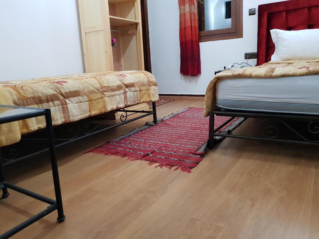 Postel nebo postele na pokoji v ubytování Riad Assia
