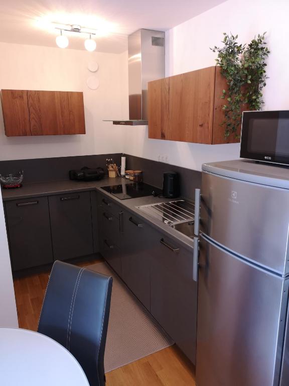 Kuchyň nebo kuchyňský kout v ubytování Apartma Lucijana