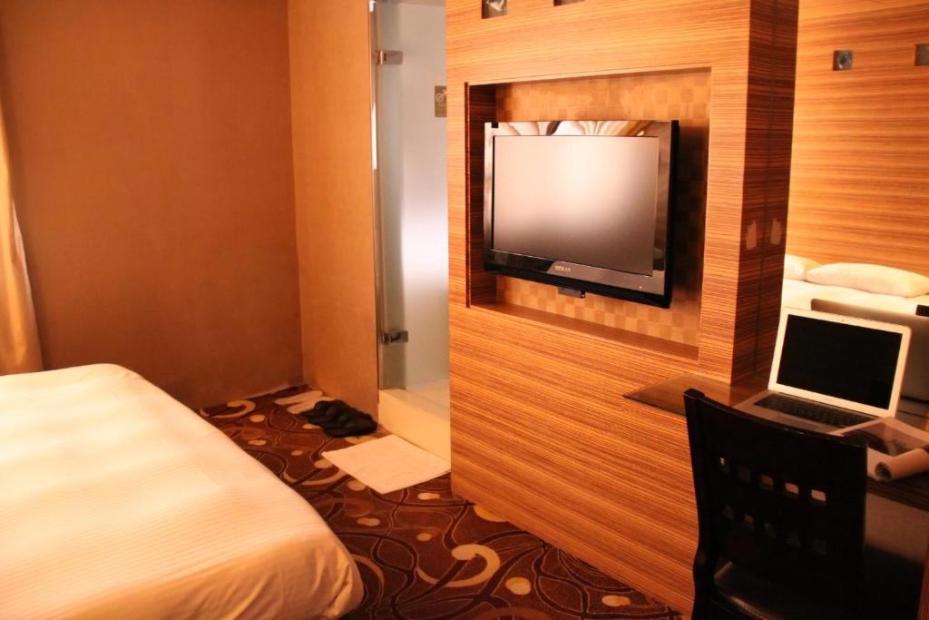TV a/nebo společenská místnost v ubytování 貴都飯店-Crystal Hotel Taipei
