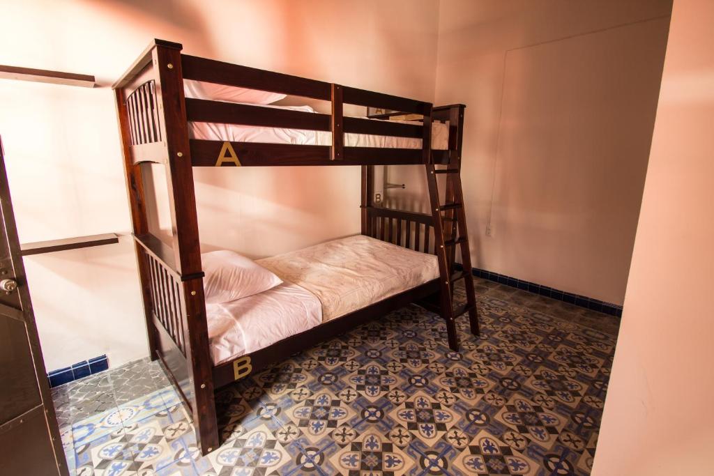 Postel nebo postele na pokoji v ubytování Casa de Juan Hostal