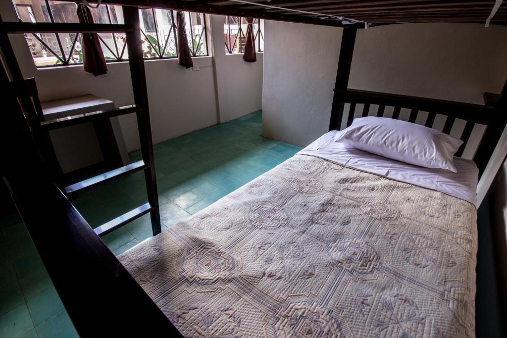 Postel nebo postele na pokoji v ubytování Casa de Juan Hostal