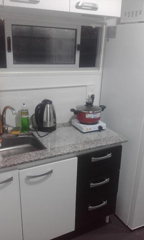 Kuchyň nebo kuchyňský kout v ubytování Complejo Containers DF