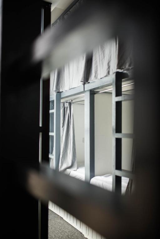 Postel nebo postele na pokoji v ubytování Avisala Hostel Coron