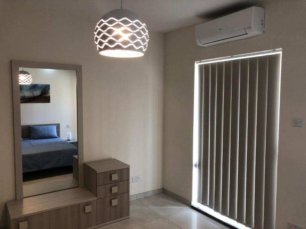Postel nebo postele na pokoji v ubytování Marsascala Sea View Apartment HPI 7738