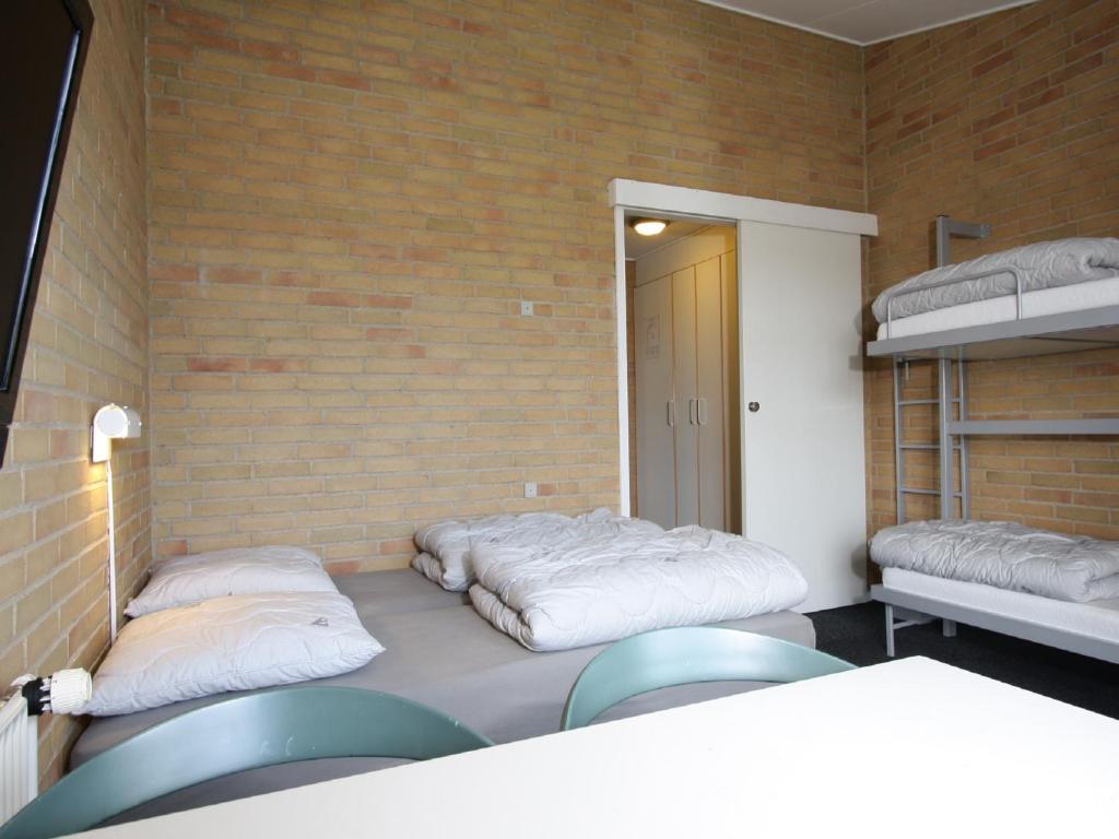 Postel nebo postele na pokoji v ubytování Danhostel Fredericia