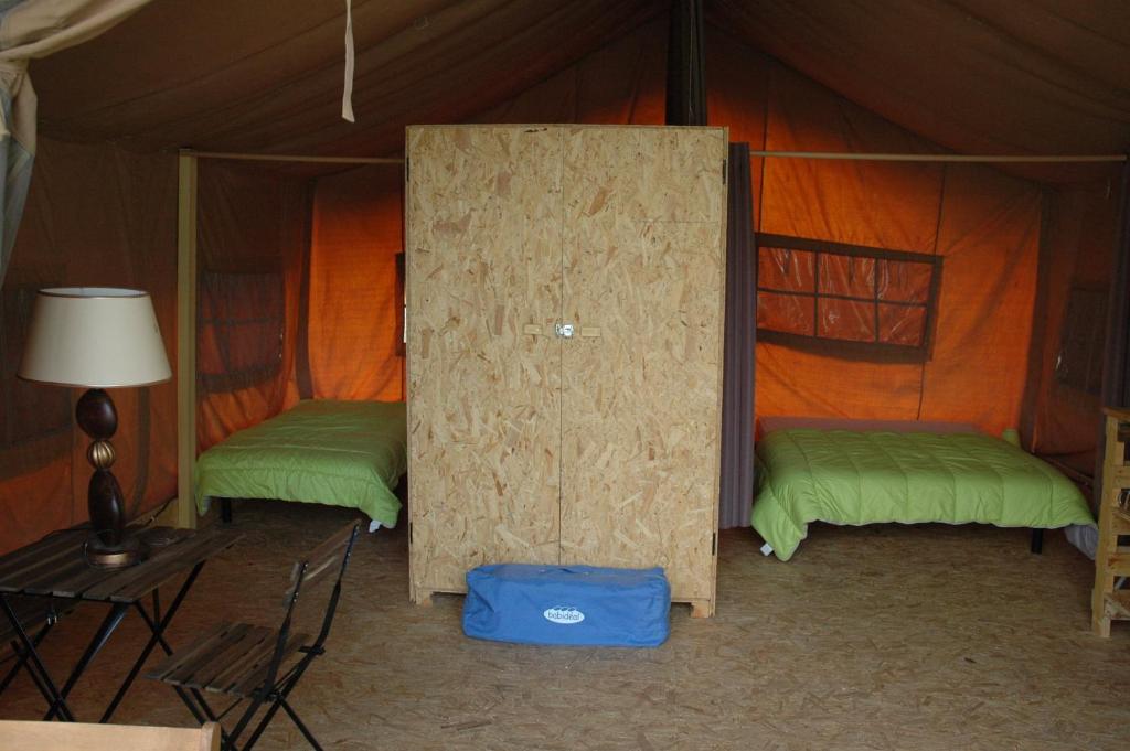 Postel nebo postele na pokoji v ubytování Camping des eydoches - 3 étoiles