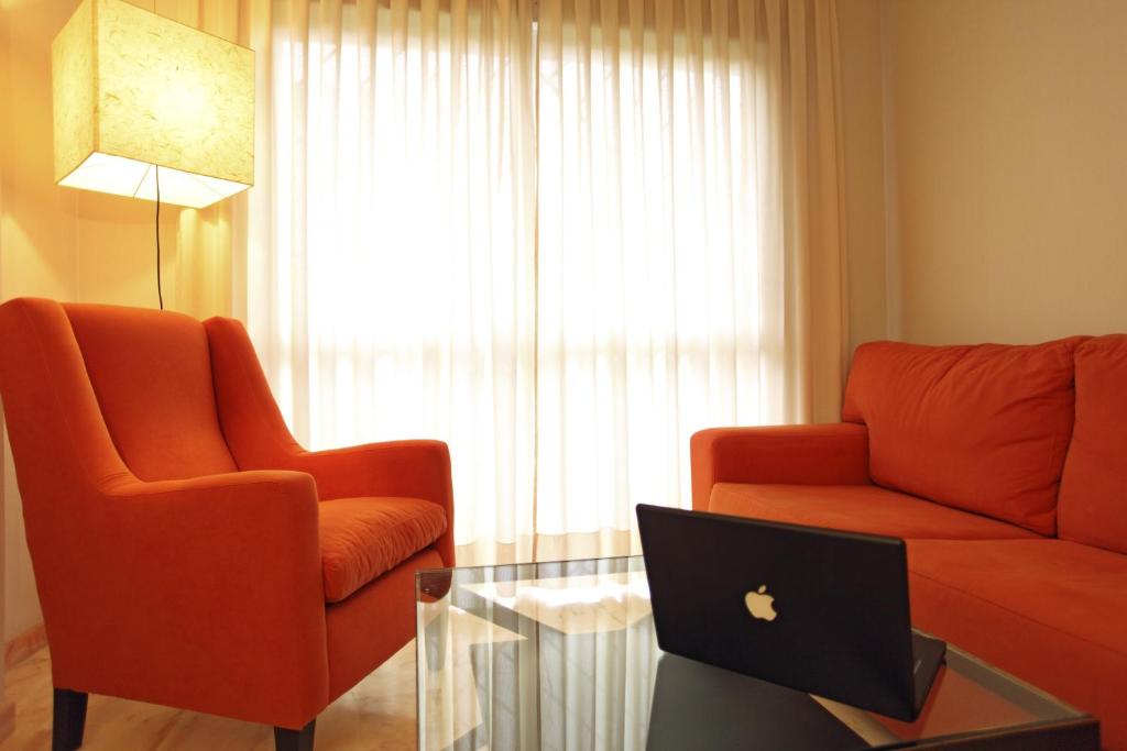 Posedenie v ubytovaní Apartamentos Vértice Bib Rambla